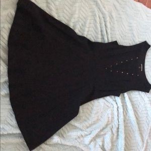 Black dress with gold stud detail